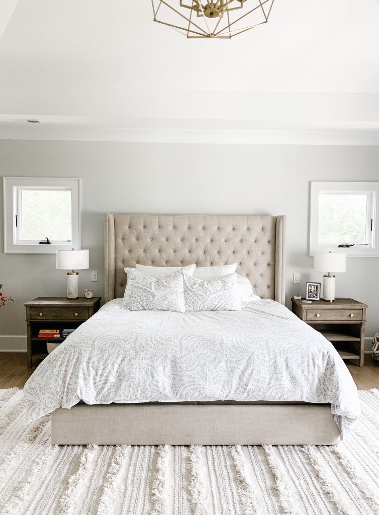 I'm sharing our cozy and neutral master bedroom complete with new curtains, comfy bedding, a floor length mirror, and the Samsung tv frame. 