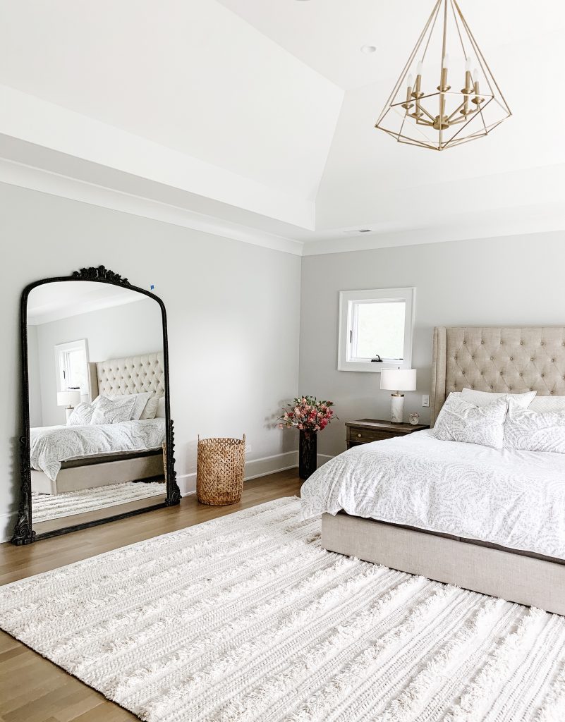 I'm sharing our cozy and neutral master bedroom complete with new curtains, comfy bedding, a floor length mirror, and the Samsung tv frame. 