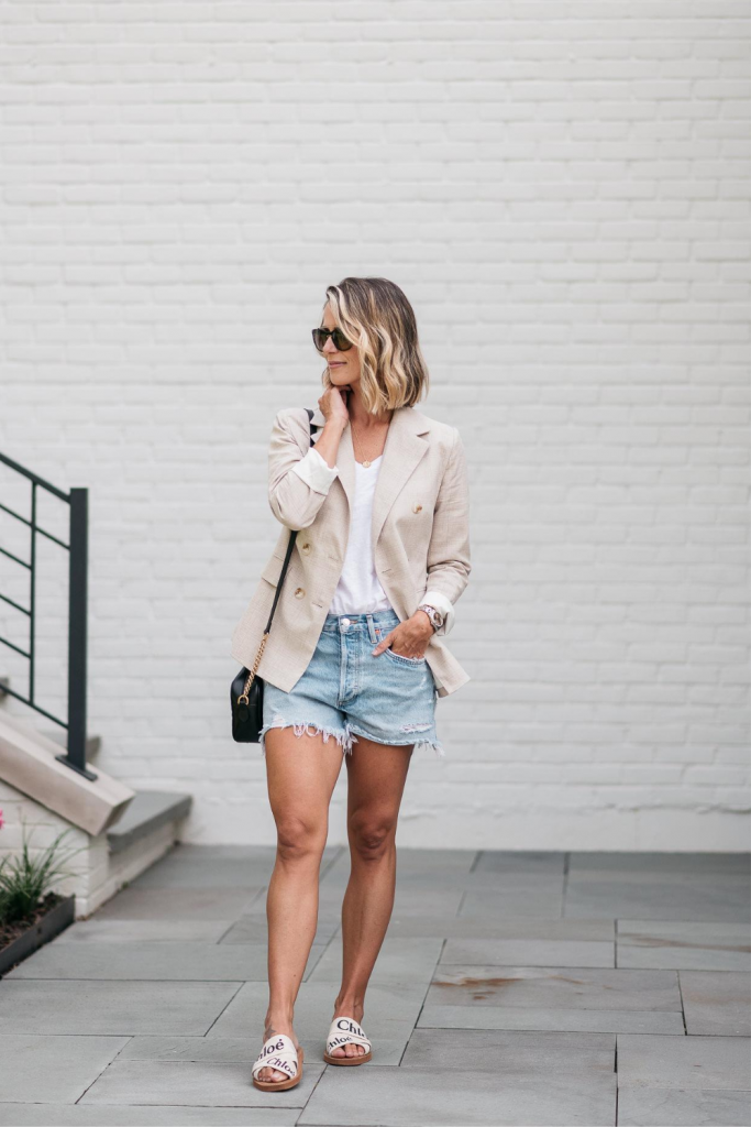 I'm pairing a chic boyfriend blazer with a pair of cut off denim shorts for the perfect outfit to transition from summer to fall.