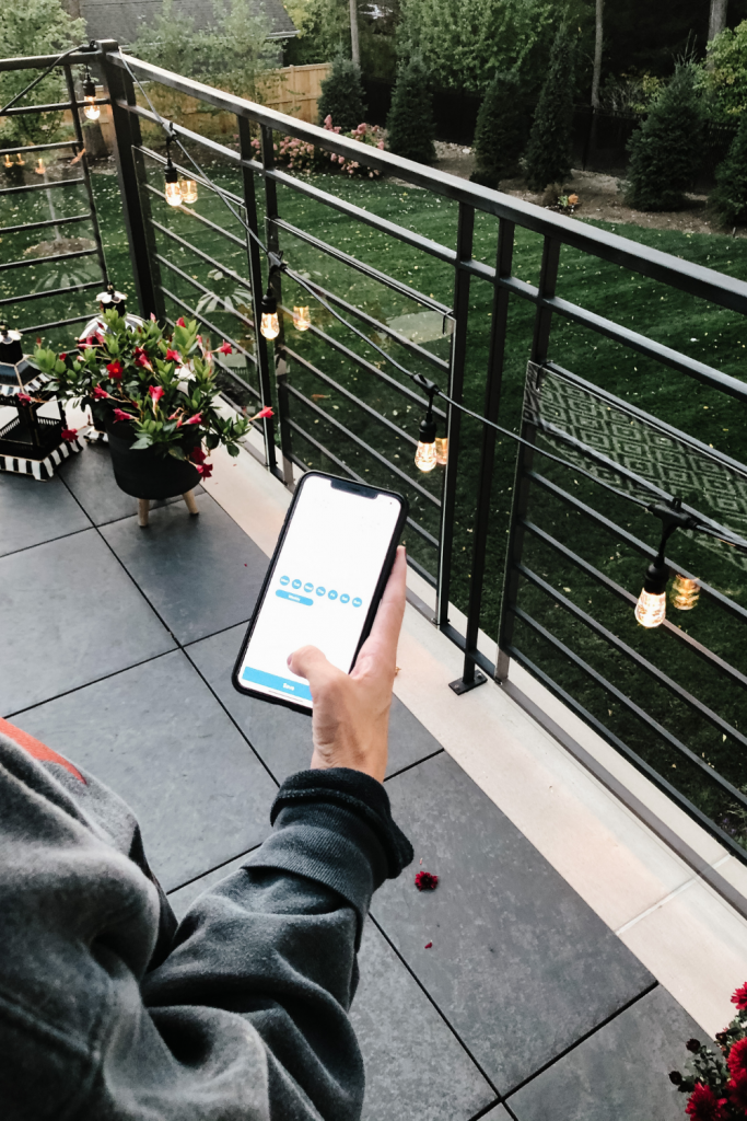 Elevate your backyard with this convenient outdoor smart plug for some outdoor lighting that is fully controlled by an app on your phone.