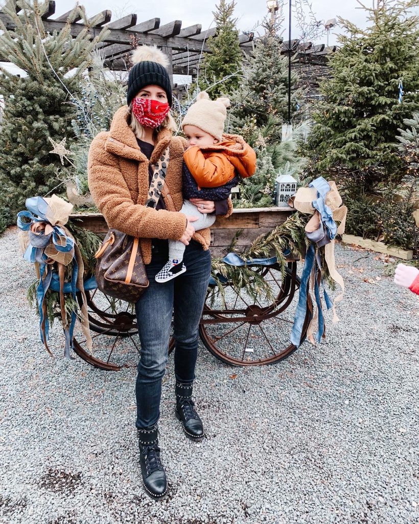 Winter outfit ideas, sherpa jacket, beanie, and moto boots