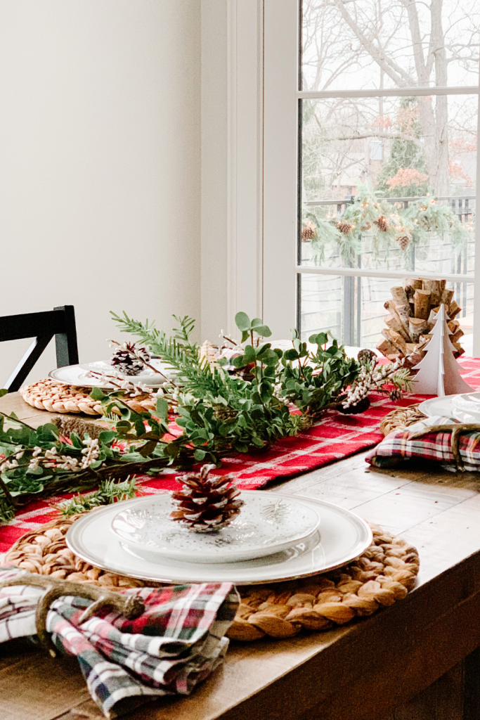 Today I'm sharing a simple holiday tablescape to spruce up your space. There's just something about a festive table, right?