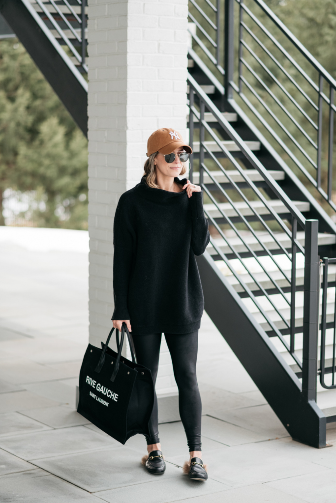How to style a cozy black Free People tunic with black faux leather Spanx leggings and mules.  