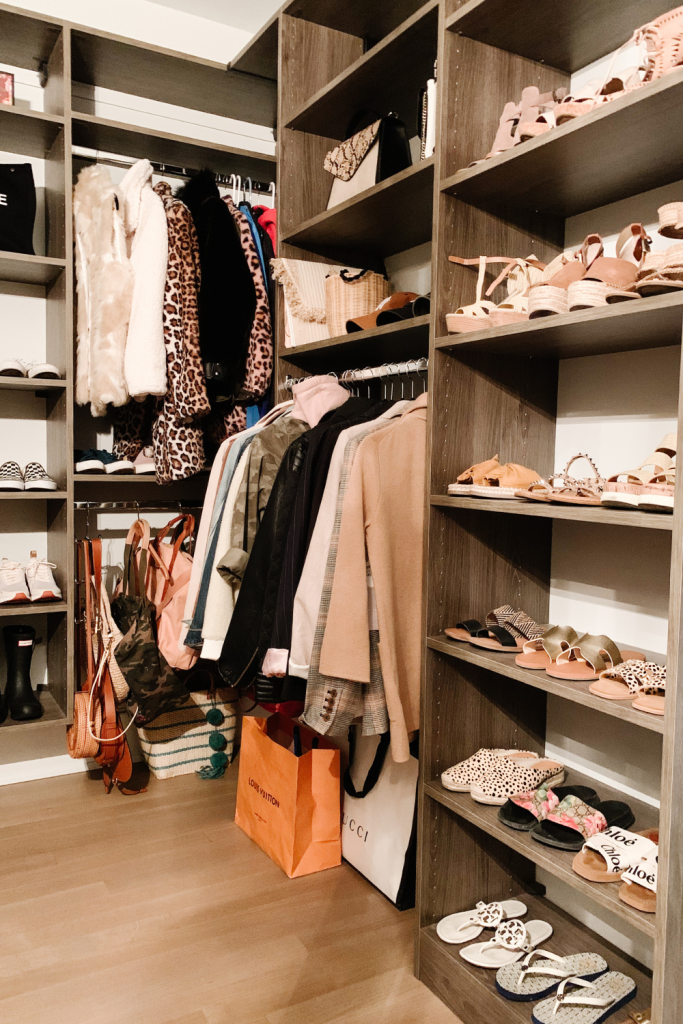 I'm giving a full closet tour complete with built in shelving, clothes storage, organization, shoe shelves, and hat storage.