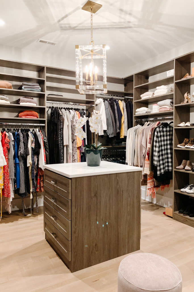 I'm giving a full closet tour complete with built in shelving, clothes storage, organization, shoe shelves, and hat storage.