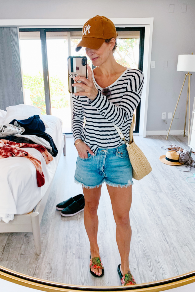 Striped tee, denim cut offs, straw tote, ball cap, Gucci slides, 