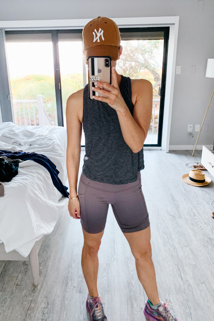 What to pack for spring break, tank, biker shorts, ball cap, sneakers