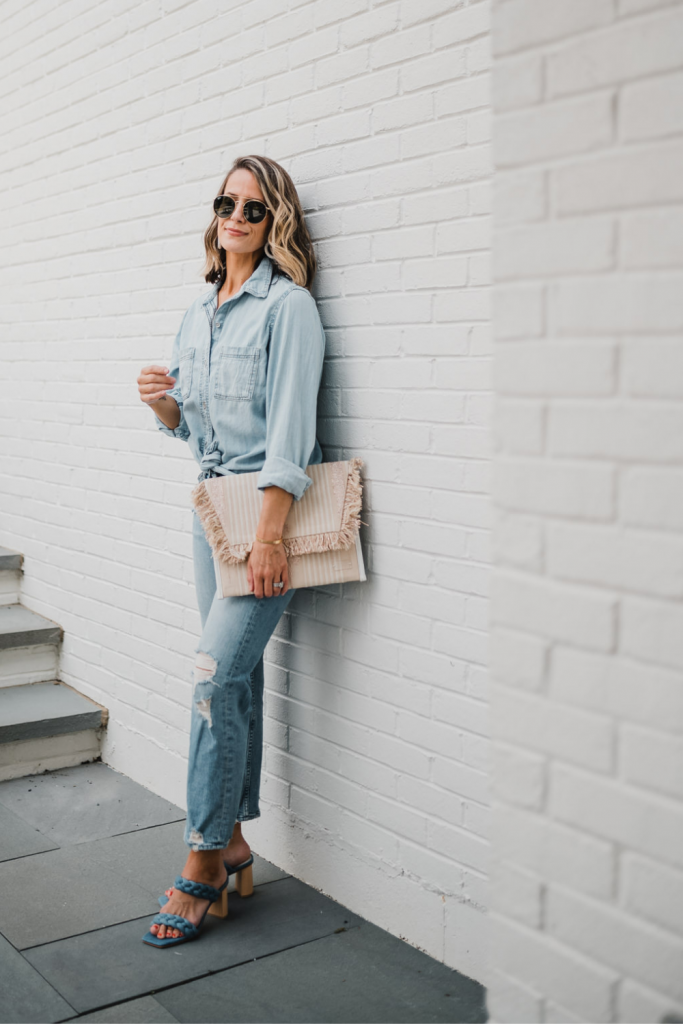 Date night: denim on denim, clutch, sunglasses, and heels