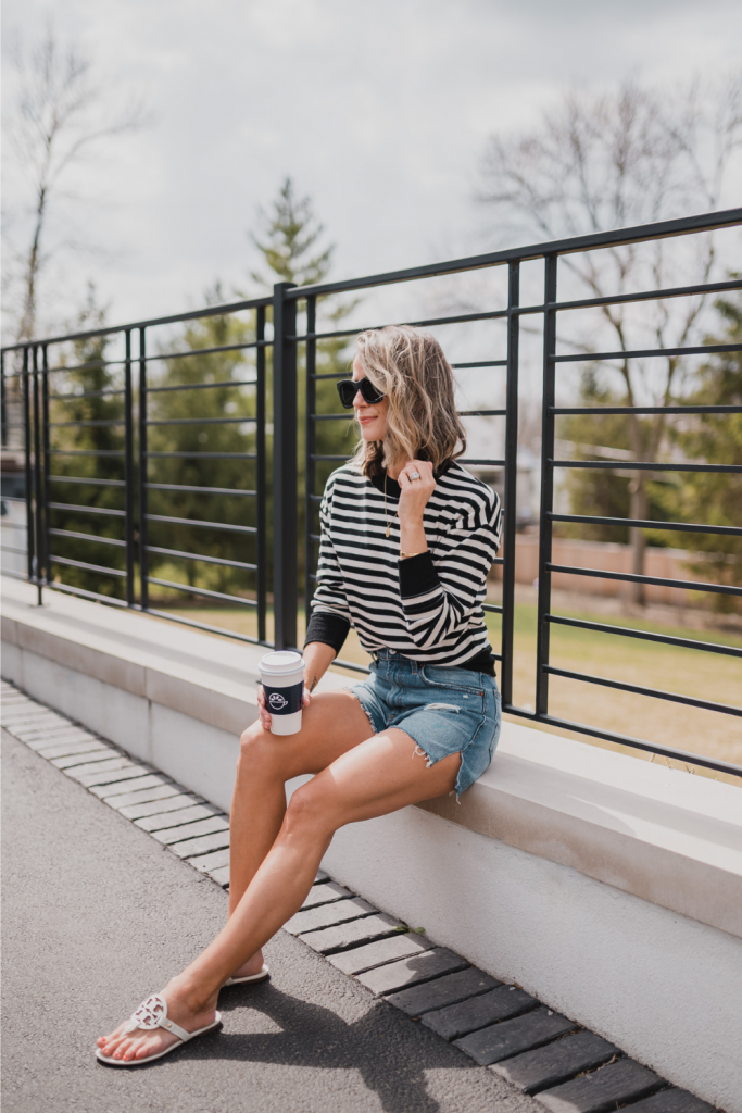 Striped sweatshirt, mom shorts, sunglasses, and sandals