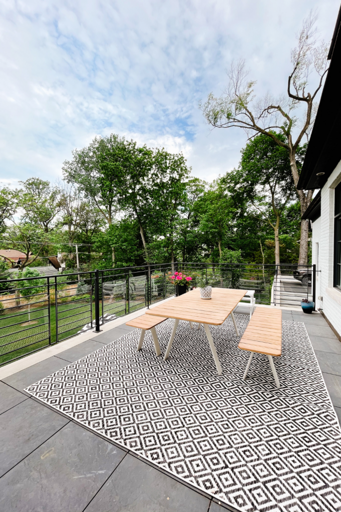 Balcony styling tips, picnic table and rug