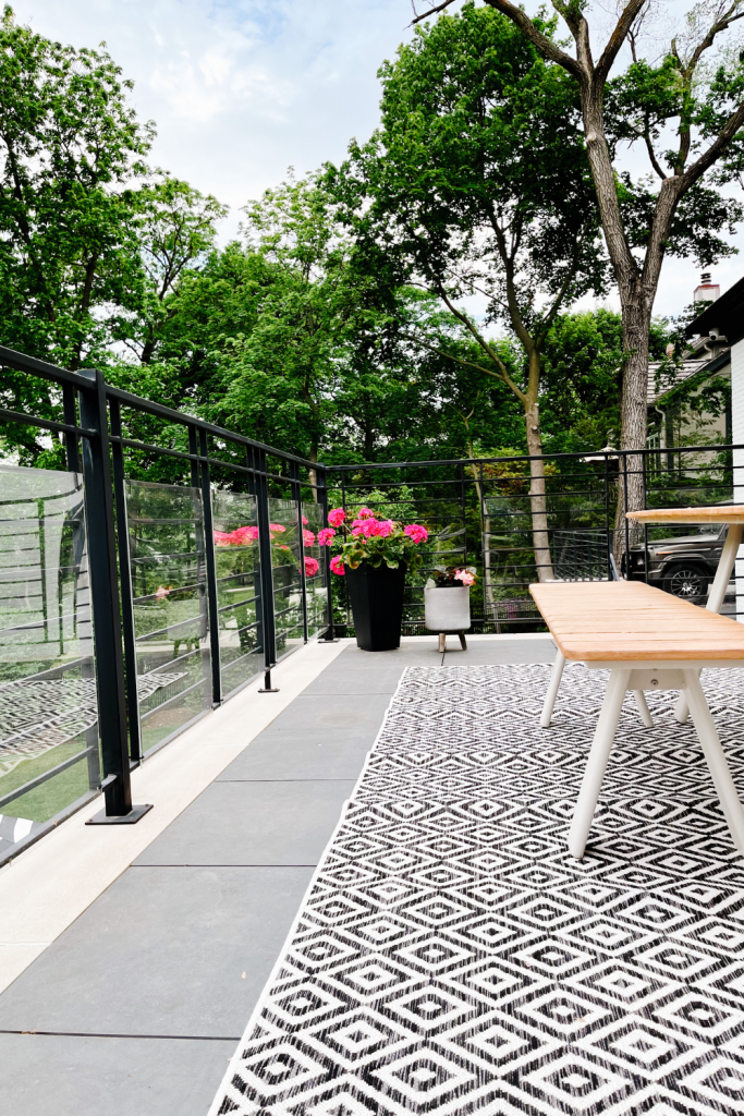 Balcony styling tips, picnic table and rug