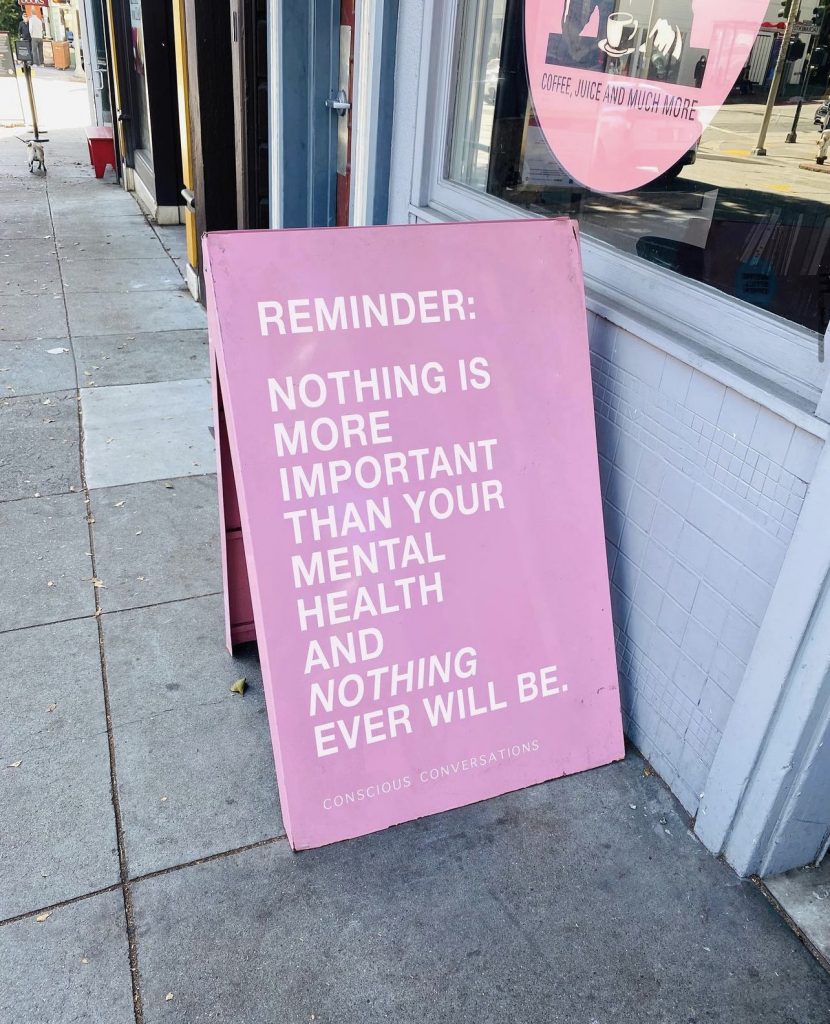 A sign with the quote,
"Reminder: Nothing is more important than your mental health and nothing ever will be."