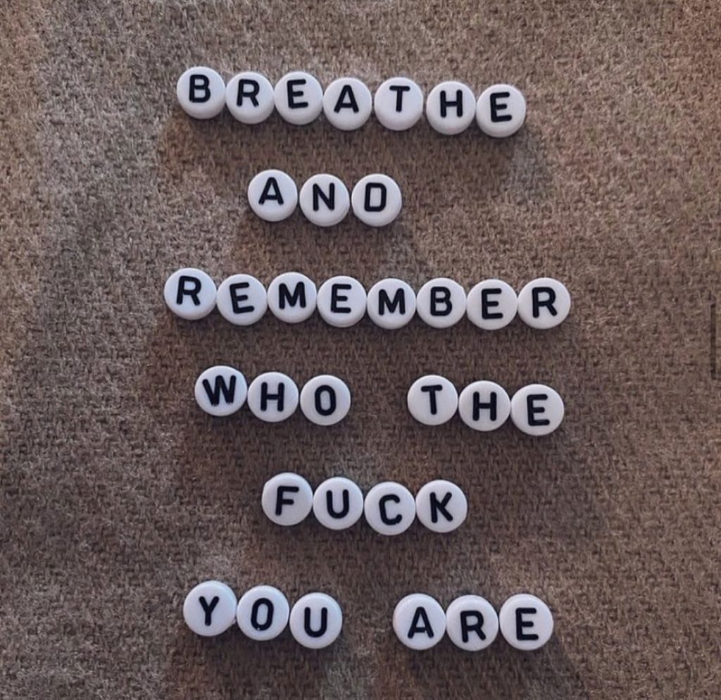 A graphic that says, "Breathe and remember who the fuck you are."