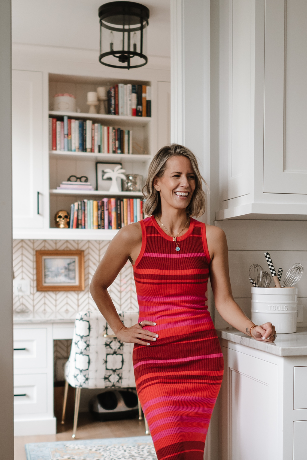 Suzanne wearing a knit midi dress